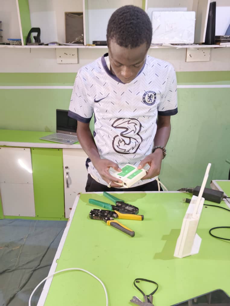 A macintosh on a yellow background.
